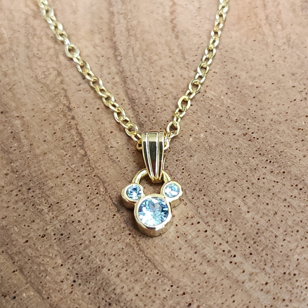 Gold Toned Mickey Mouse Necklace with Blue Crystal March Birthstone
